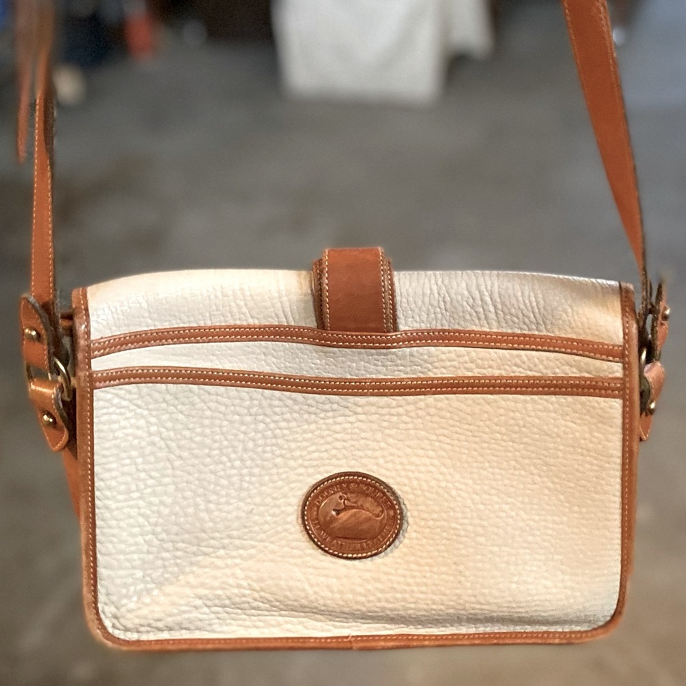 White leather purse with brown straps Dooney & Burke
